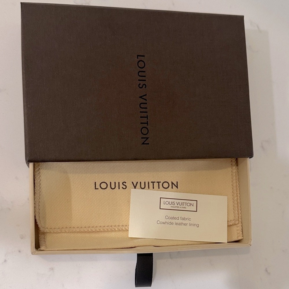 Authentic Louis Vuitton Box with matching LV duster pouch